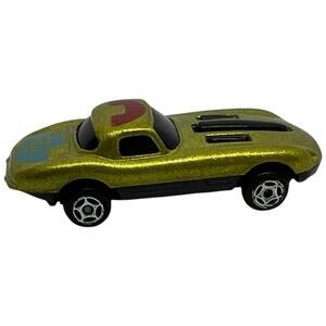 Vintage Gold Metallic Racing Car with Telephone Icons Diecast Toy